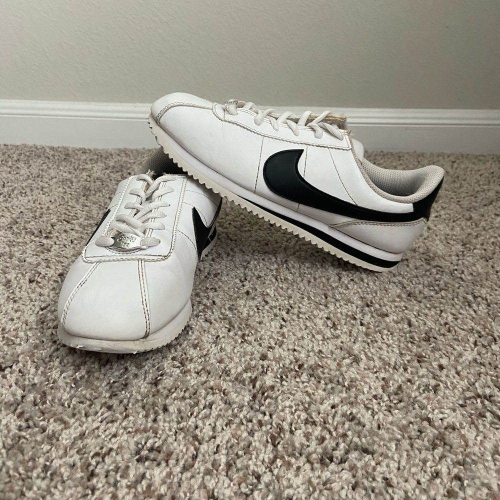 Black and white nike Cortez
